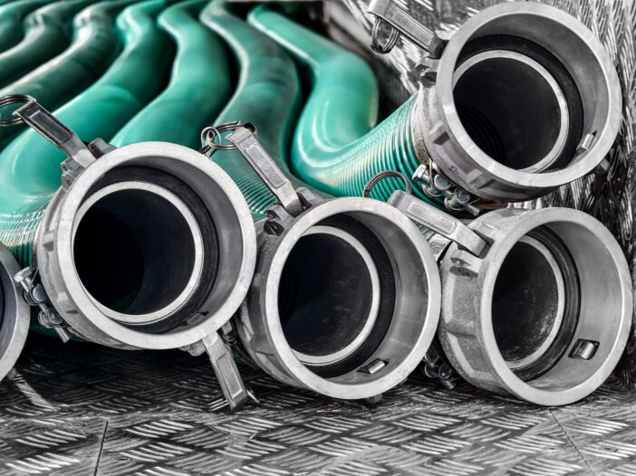 green industrial hose with camlock fittings